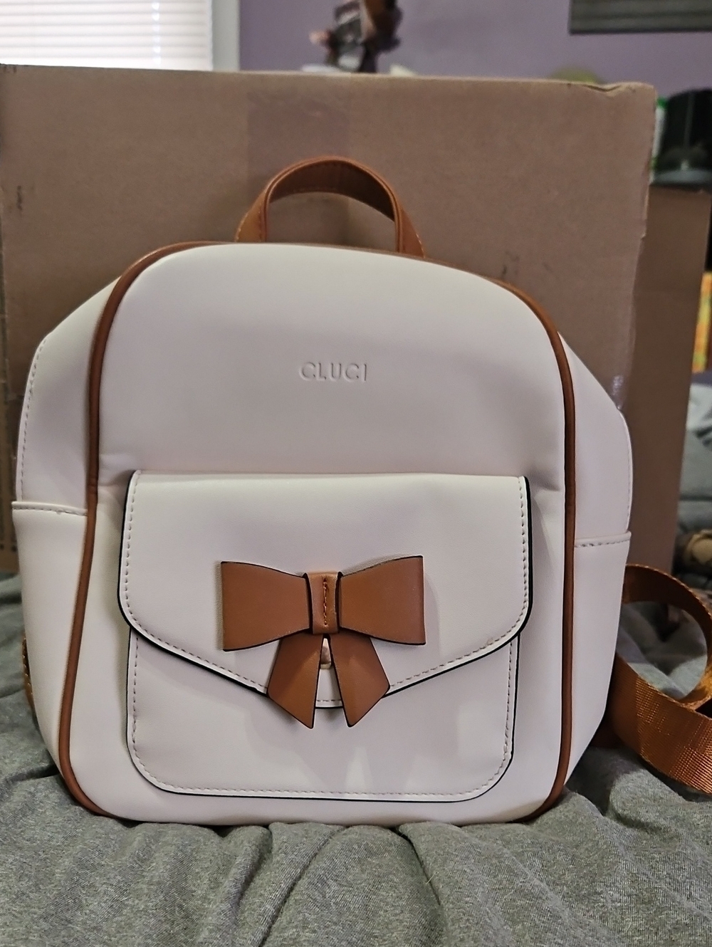 Cluci Cream Mini Backpack with Tan Bow Accent